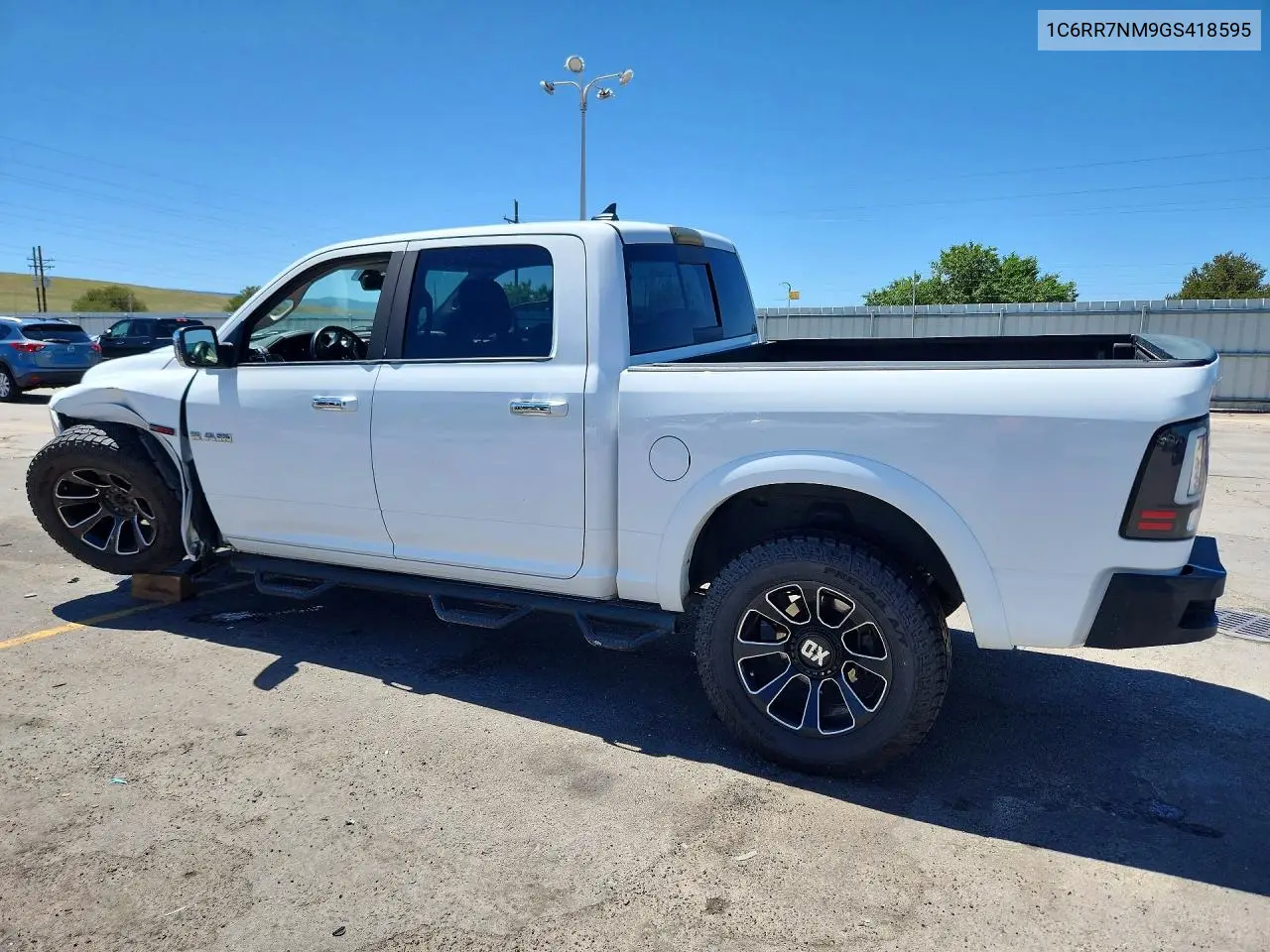 2016 Ram 1500 Laramie VIN: 1C6RR7NM9GS418595 Lot: 56854576
