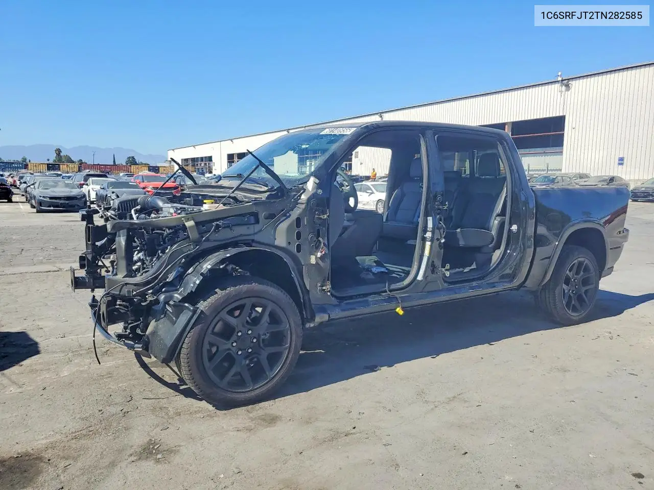 2026 Ram 1500 Laramie VIN: 1C6SRFJT2TN282585 Lot: 60140956
