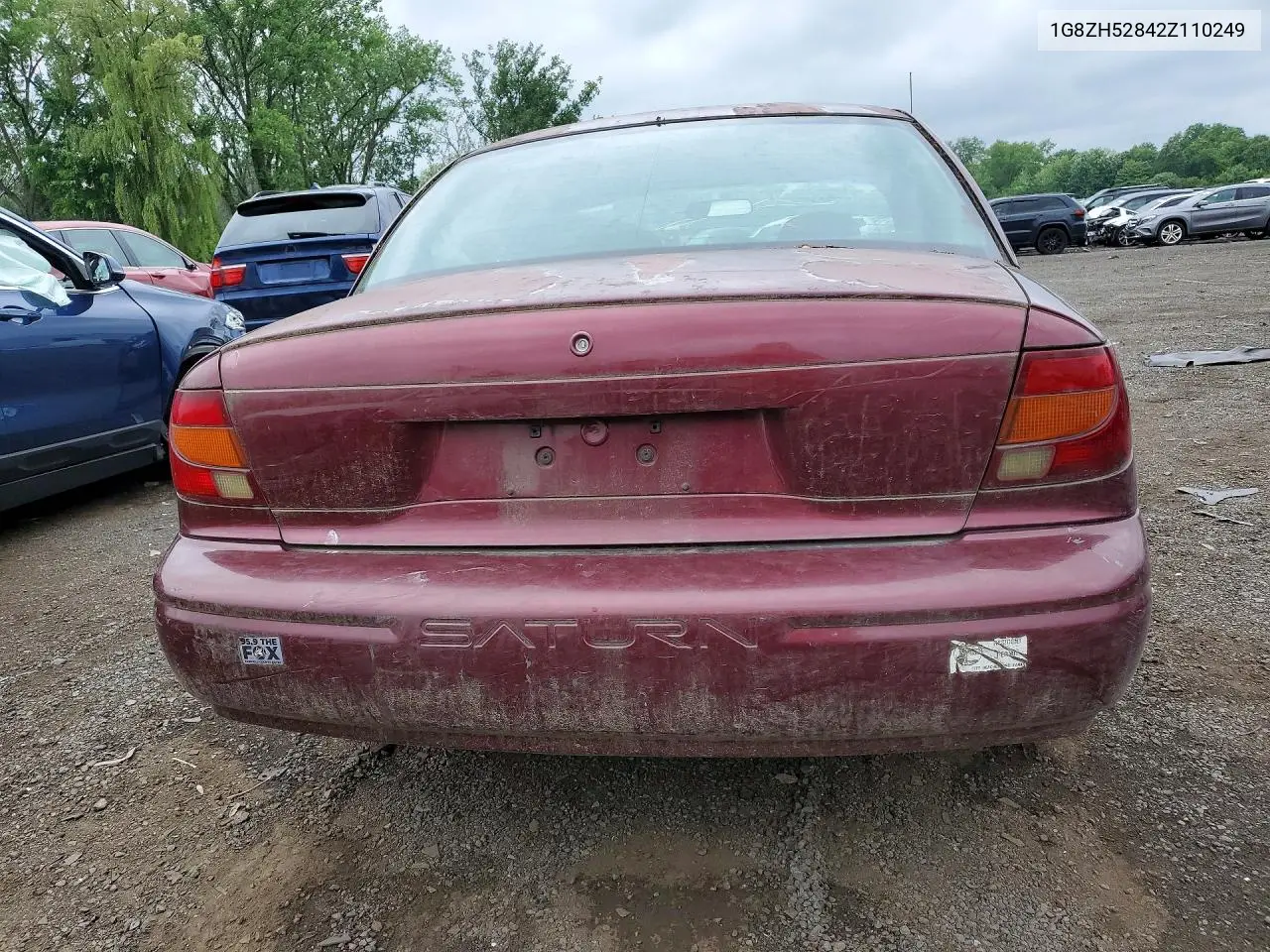 2002 Saturn 4Dr VIN: 1G8ZH52842Z110249 Lot: 57625896