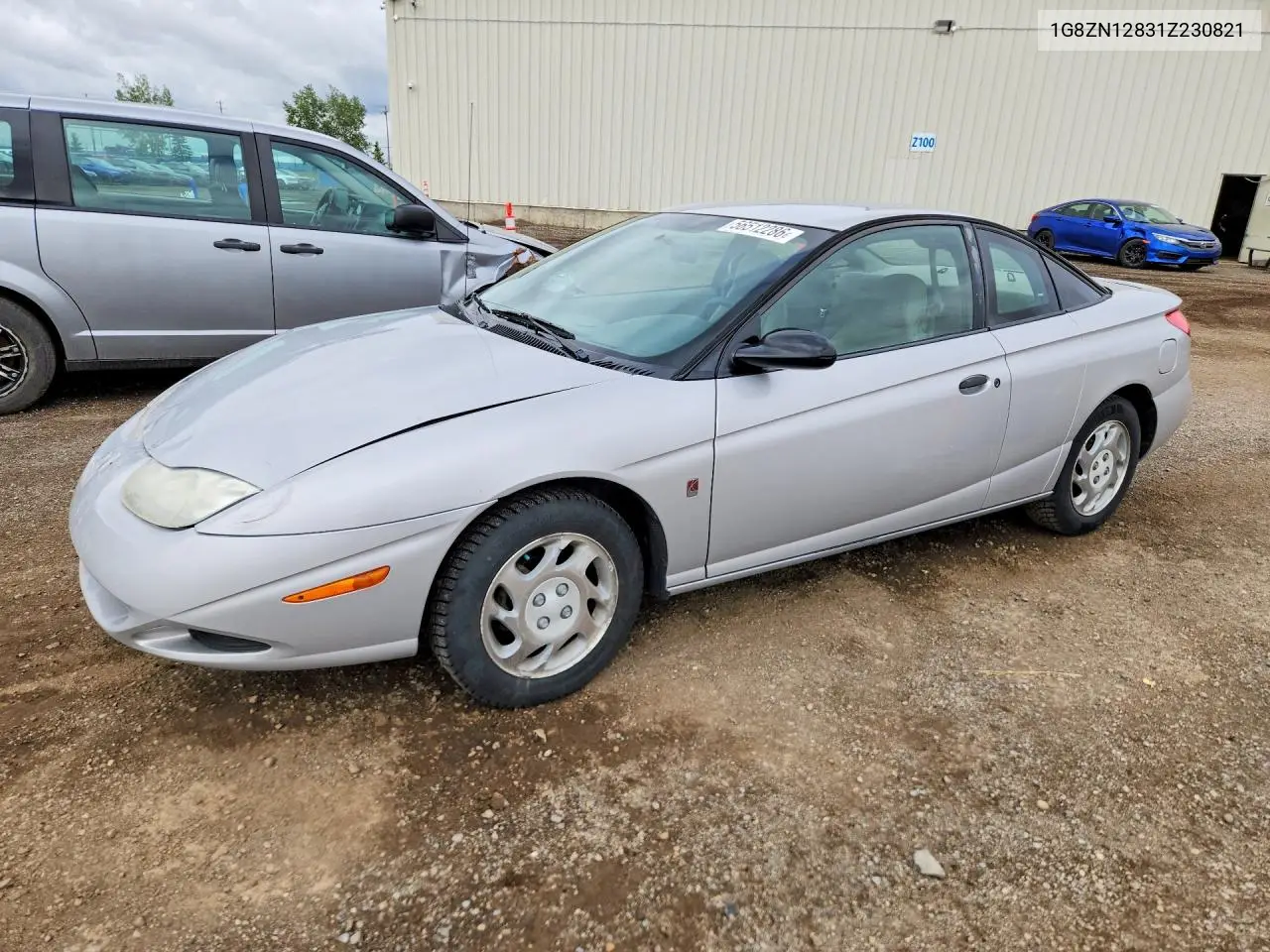 2001 Saturn Sc1 VIN: 1G8ZN12831Z230821 Lot: 56512286
