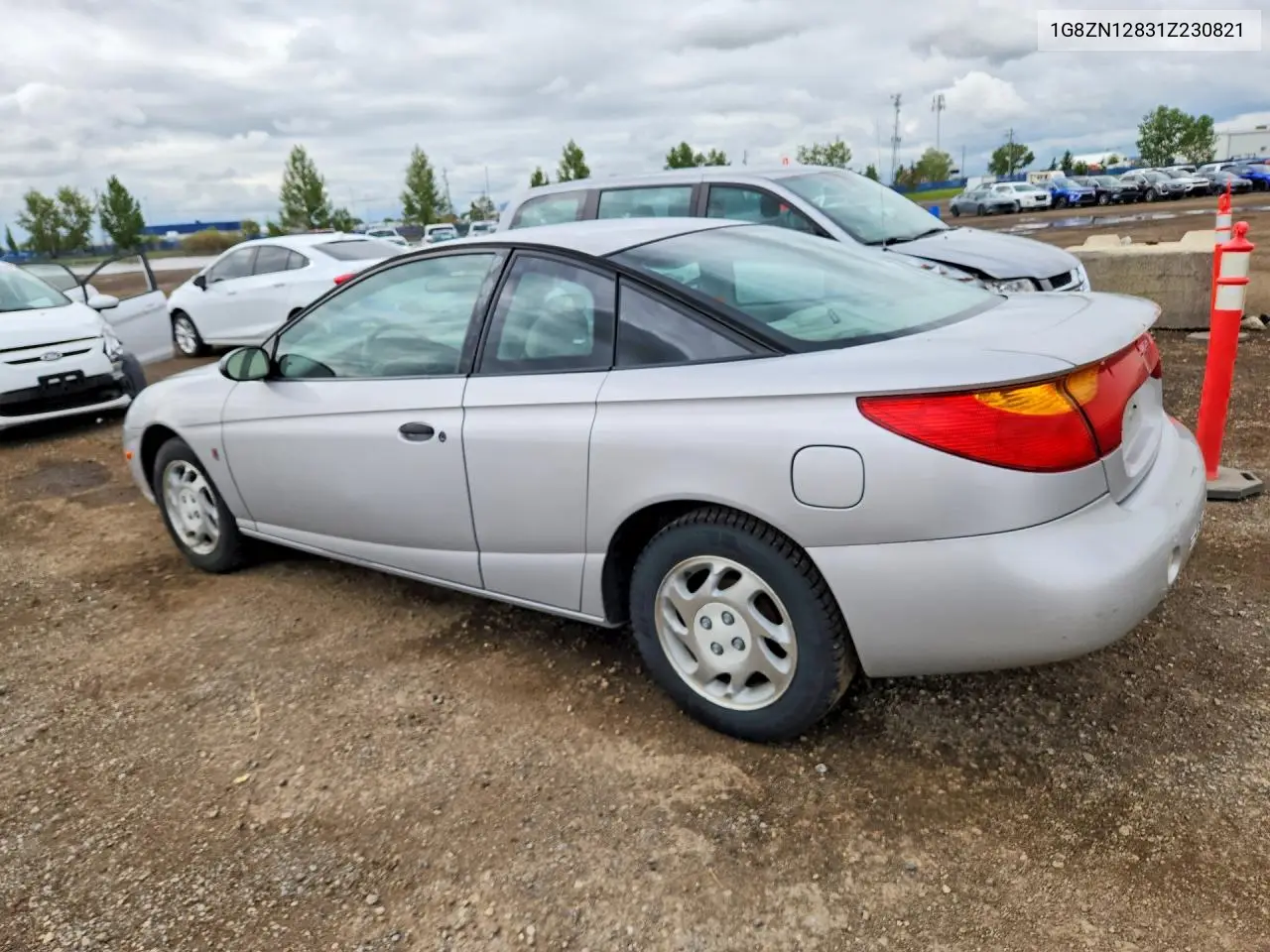 2001 Saturn Sc1 VIN: 1G8ZN12831Z230821 Lot: 56512286