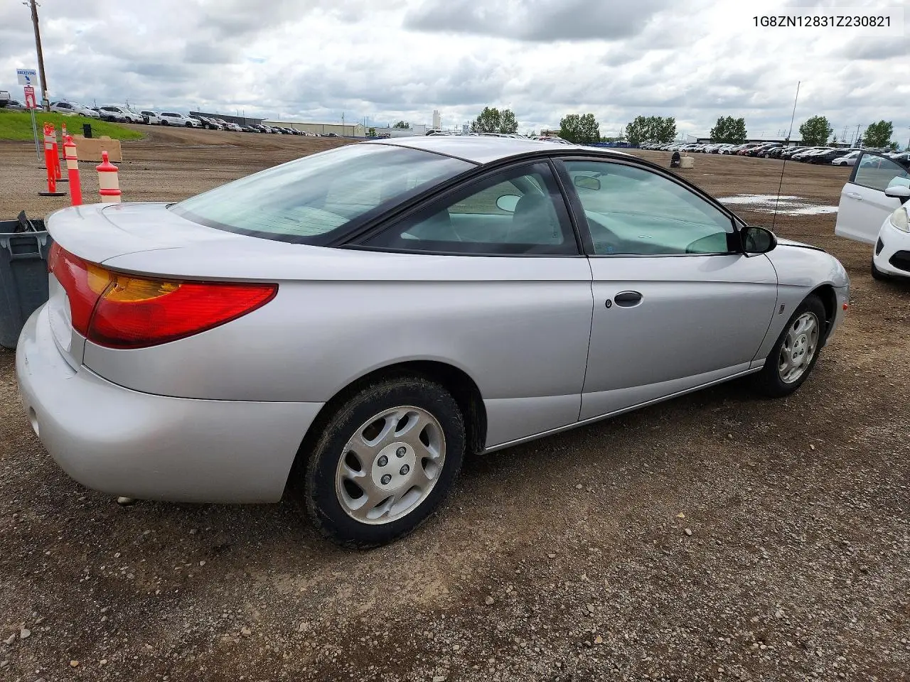 2001 Saturn Sc1 VIN: 1G8ZN12831Z230821 Lot: 56512286