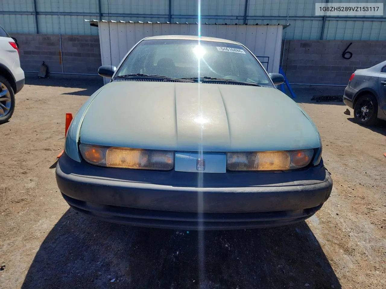 1997 Saturn Sl1 VIN: 1G8ZH5289VZ153117 Lot: 54616886