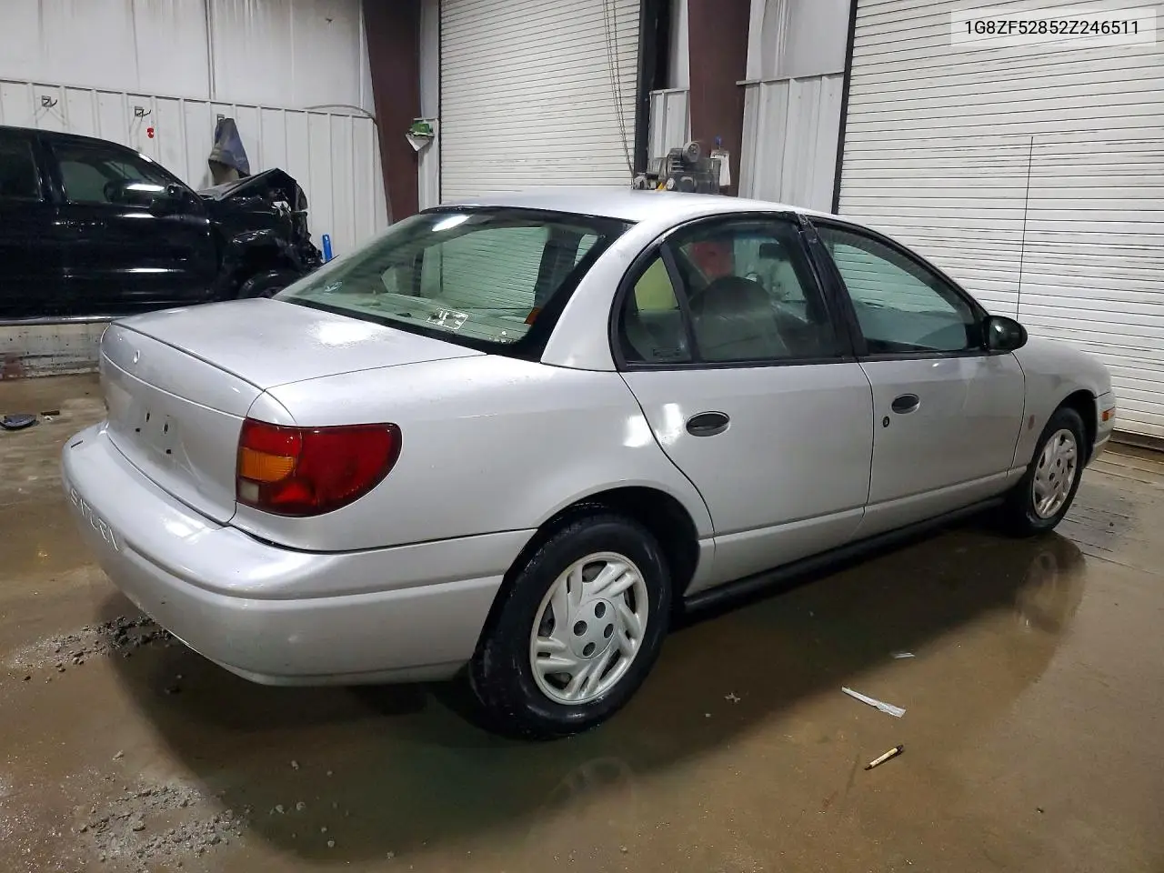 2002 Saturn Sl VIN: 1G8ZF52852Z246511 Lot: 56903356