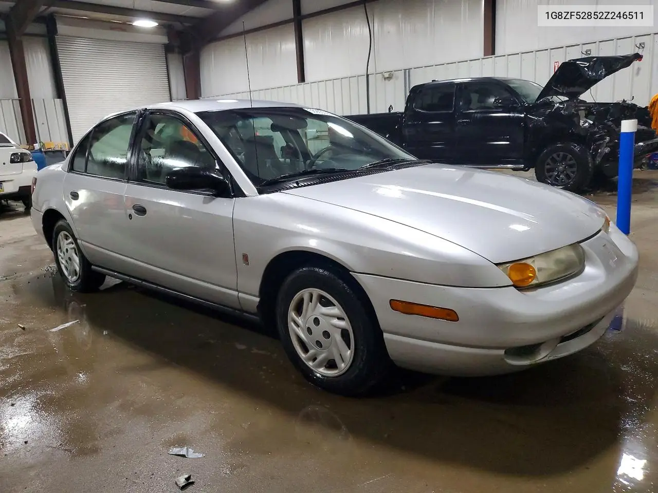 2002 Saturn Sl VIN: 1G8ZF52852Z246511 Lot: 56903356