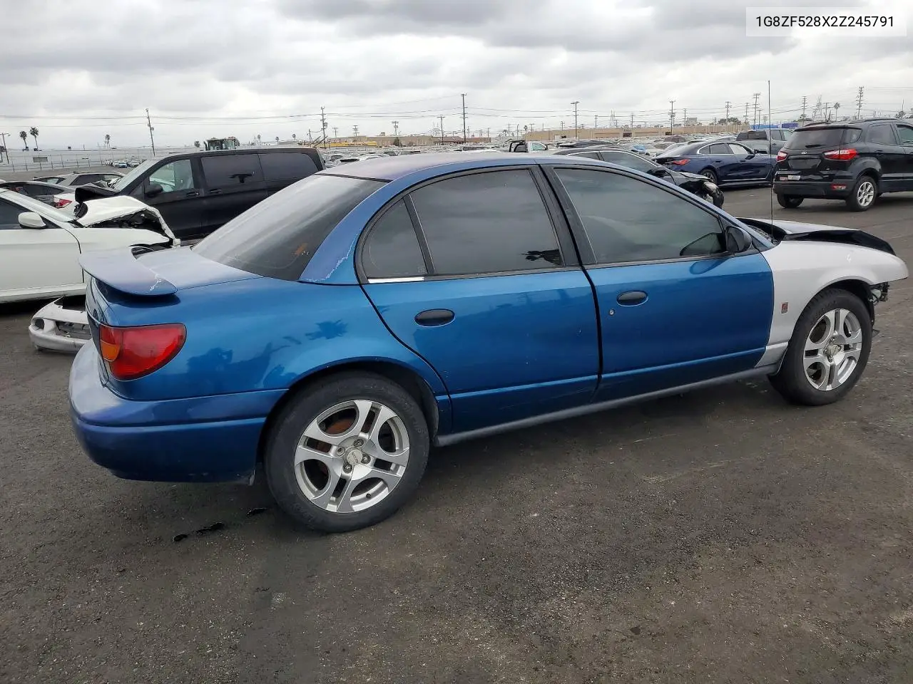 2002 Saturn Sl VIN: 1G8ZF528X2Z245791 Lot: 76848835