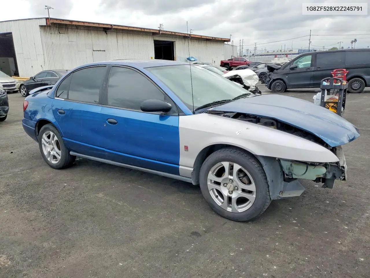 2002 Saturn Sl VIN: 1G8ZF528X2Z245791 Lot: 76848835