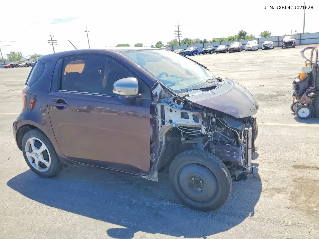 2012 Scion Iq Base VIN: JTNJJXB04CJ021628 Lot: 56050446