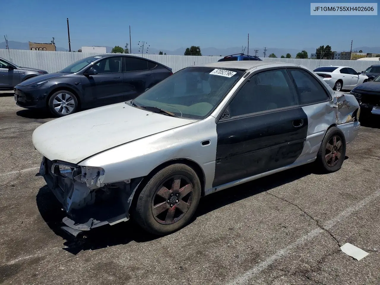 1999 Subaru Impreza Rs VIN: JF1GM6755XH402606 Lot: 57052796