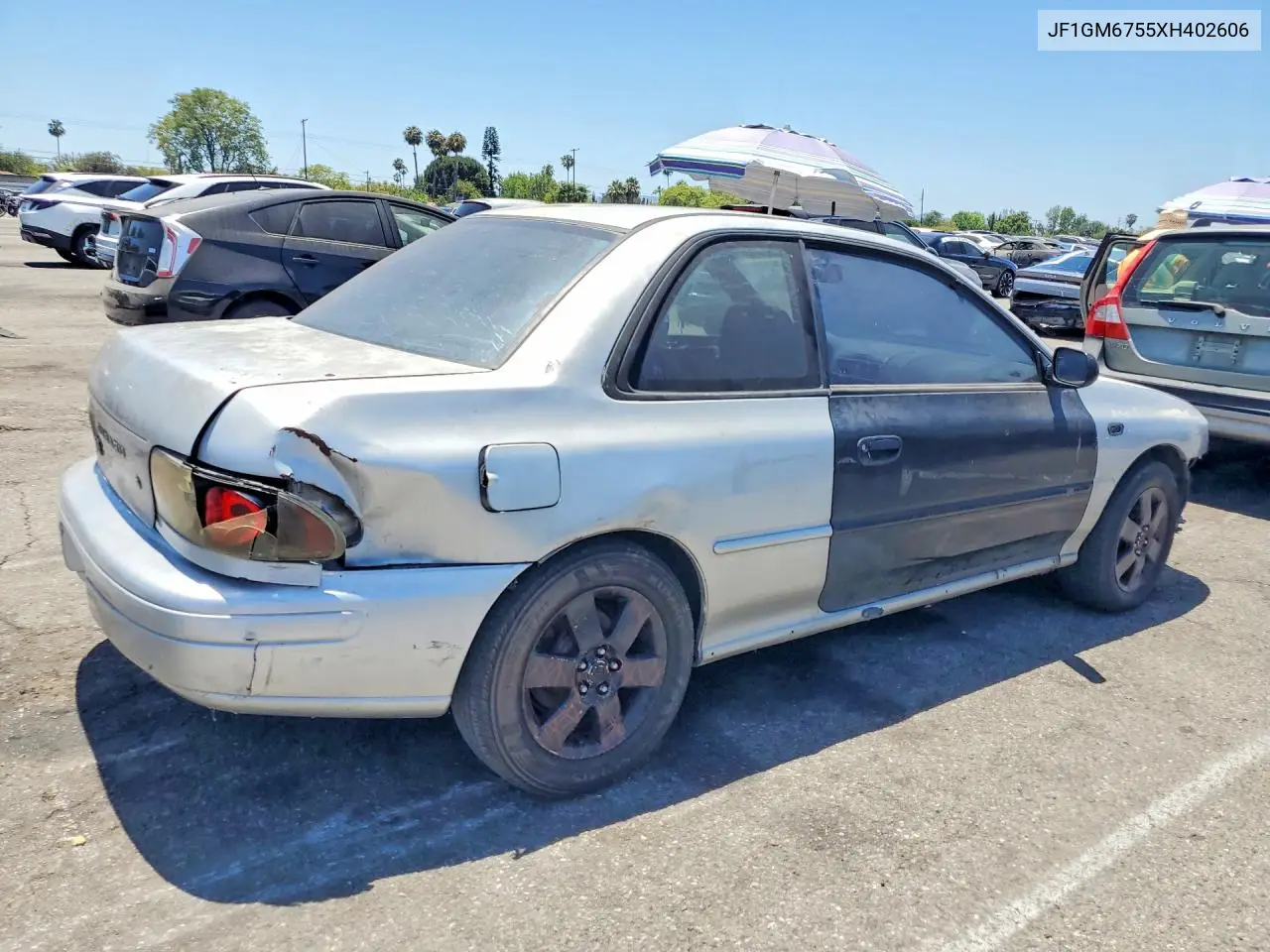 1999 Subaru Impreza Rs VIN: JF1GM6755XH402606 Lot: 57052796