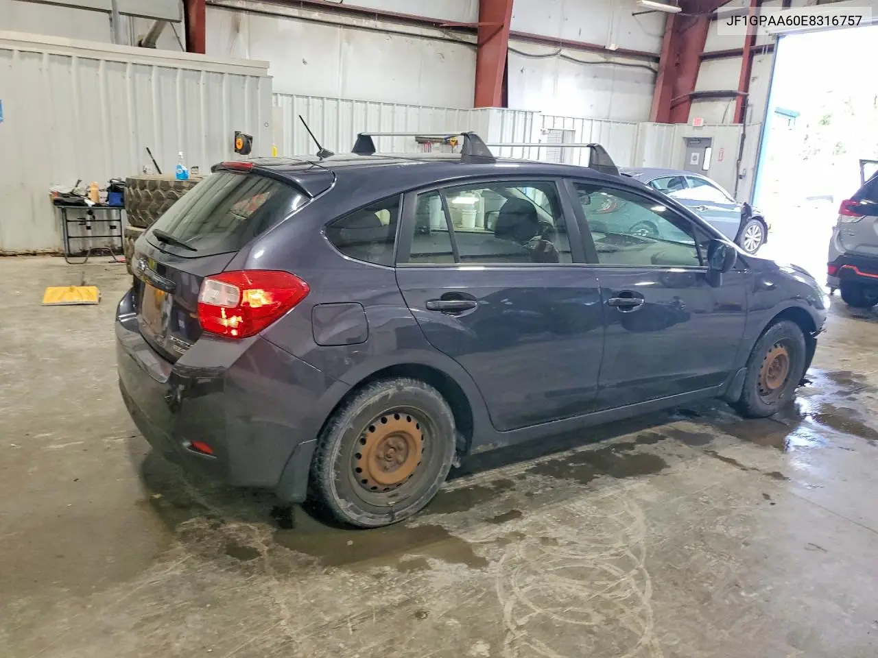 2014 Subaru Impreza VIN: JF1GPAA60E8316757 Lot: 61982586