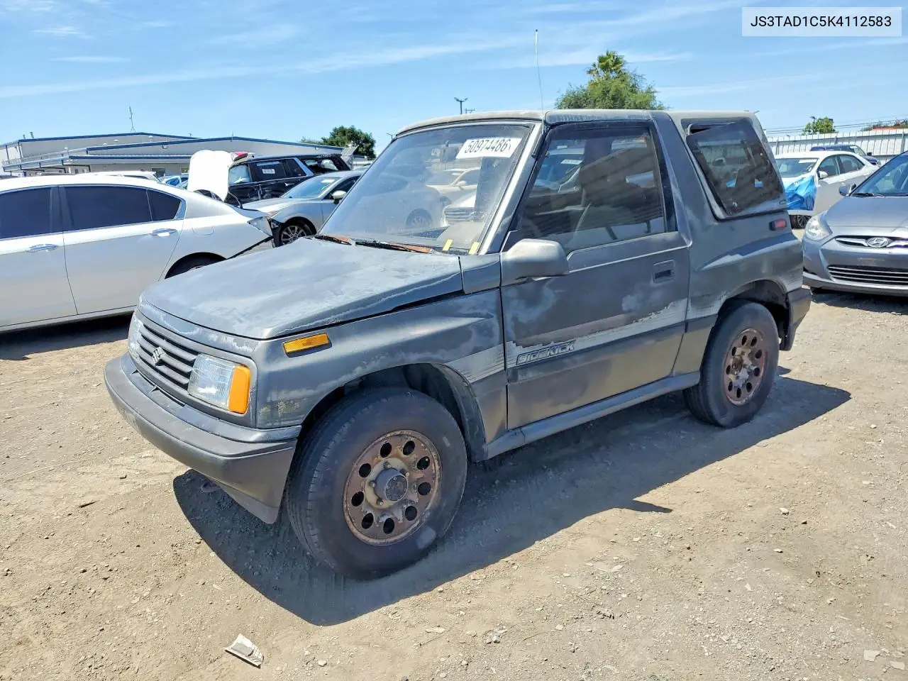 1989 Suzuki Sidekick VIN: JS3TAD1C5K4112583 Lot: 50974486