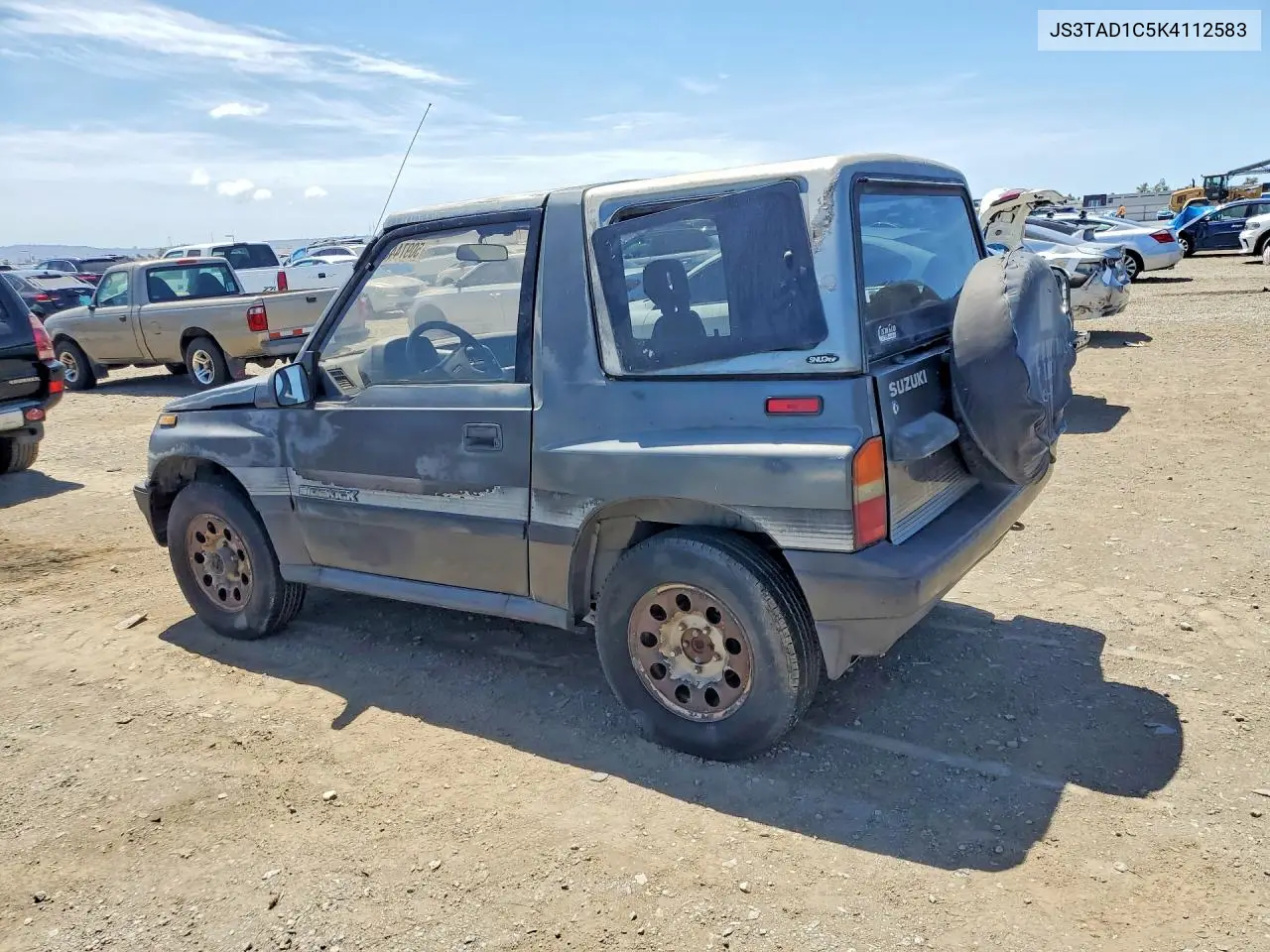 1989 Suzuki Sidekick VIN: JS3TAD1C5K4112583 Lot: 50974486