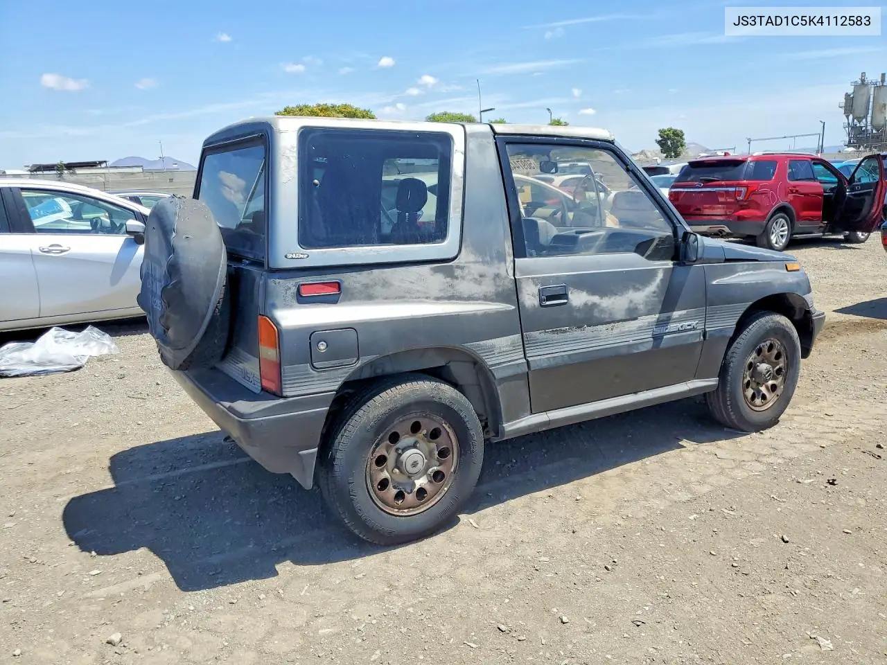 1989 Suzuki Sidekick VIN: JS3TAD1C5K4112583 Lot: 50974486