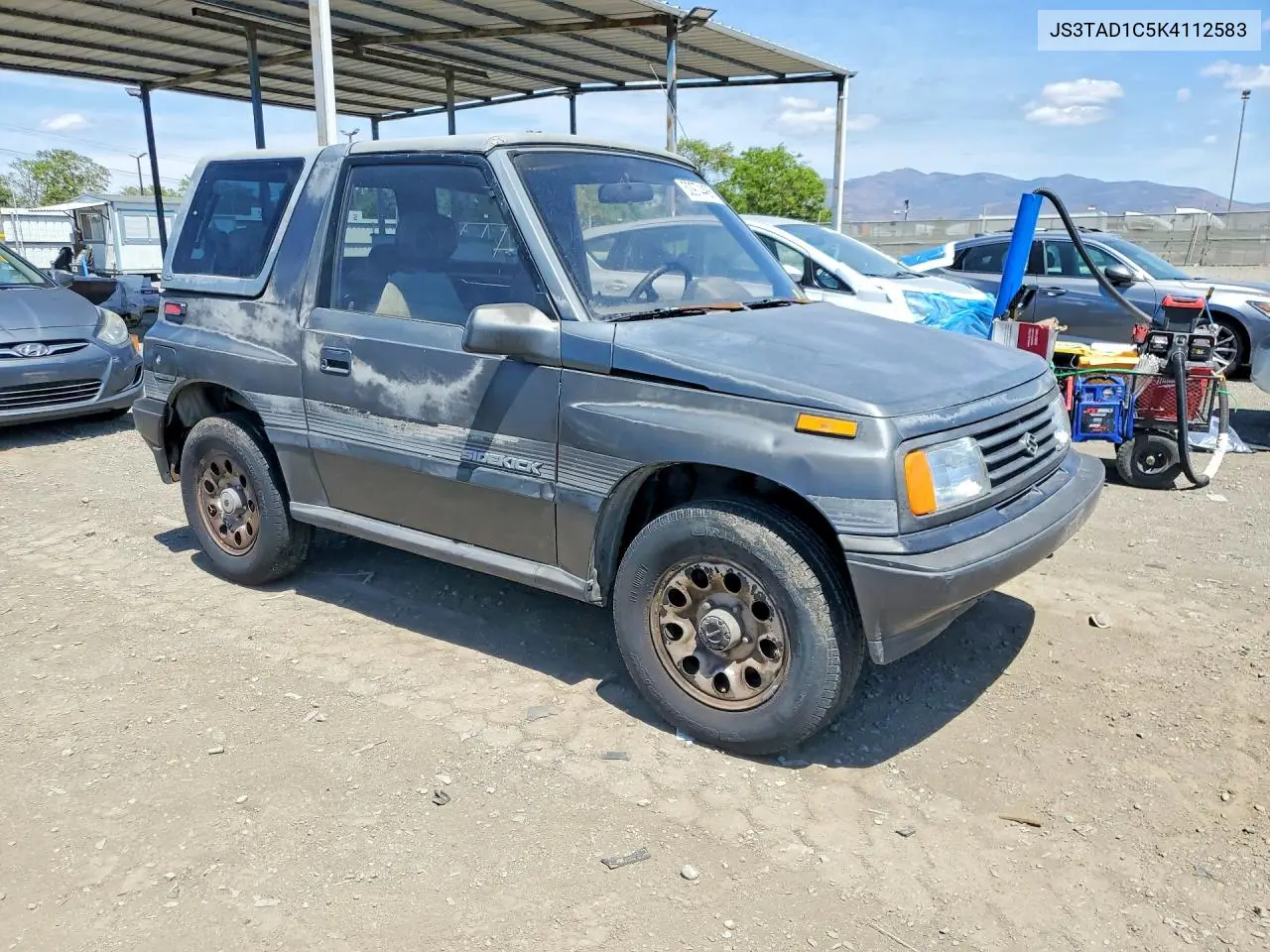 1989 Suzuki Sidekick VIN: JS3TAD1C5K4112583 Lot: 50974486