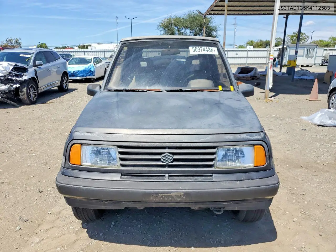 1989 Suzuki Sidekick VIN: JS3TAD1C5K4112583 Lot: 50974486