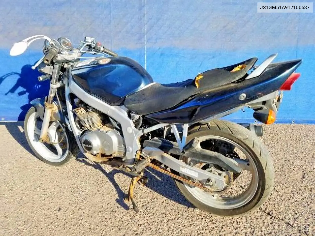 2001 Suzuki Gs500 VIN: JS1GM51A912100587 Lot: 58122356