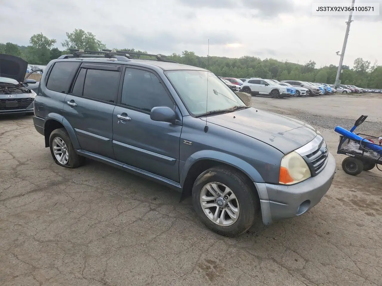 2006 Suzuki Xl7 VIN: JS3TX92V364100571 Lot: 61956046