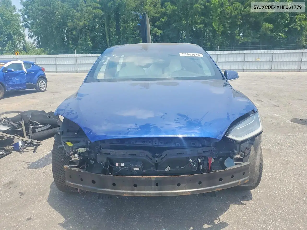 2017 Tesla Model X VIN: 5YJXCDE4XHF061779 Lot: 58942616