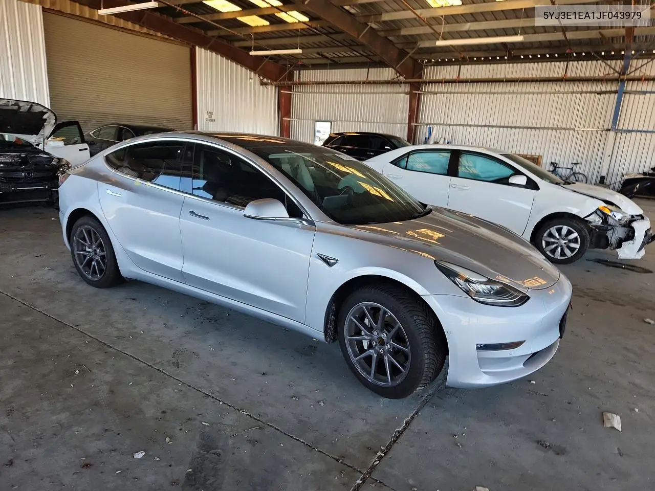 2018 Tesla Model 3 VIN: 5YJ3E1EA1JF043979 Lot: 57238306