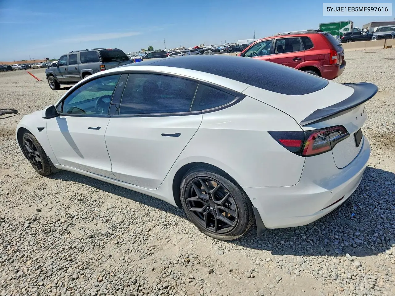 2021 Tesla Model 3 VIN: 5YJ3E1EB5MF997616 Lot: 57859466