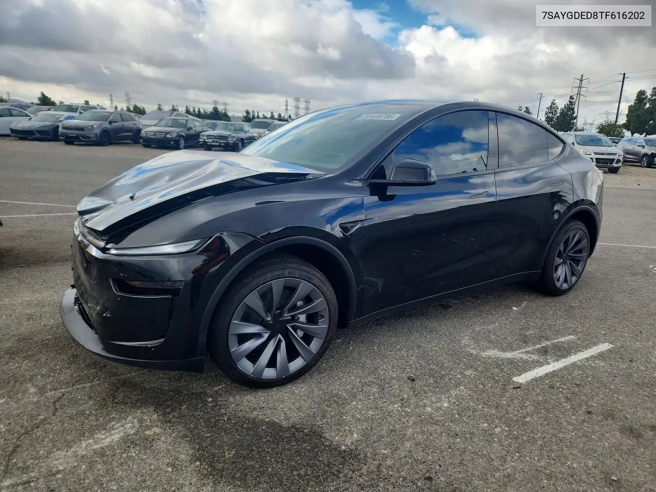 2026 Tesla Model Y VIN: 7SAYGDED8TF616202 Lot: 55449786