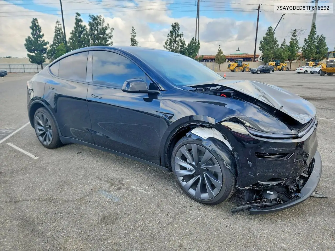 2026 Tesla Model Y VIN: 7SAYGDED8TF616202 Lot: 55449786