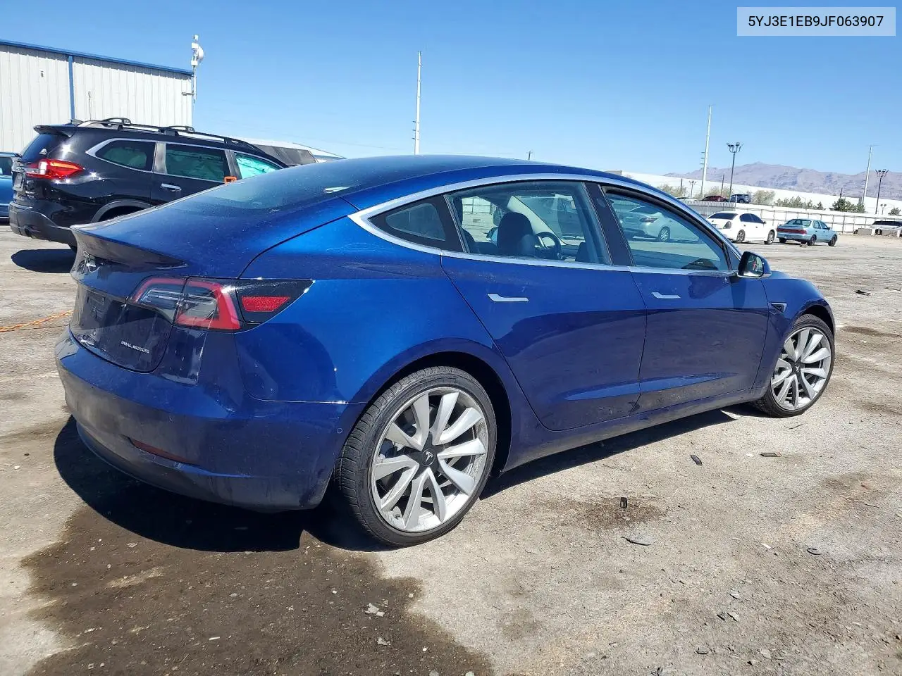 2018 Tesla Model 3 VIN: 5YJ3E1EB9JF063907 Lot: 59092156