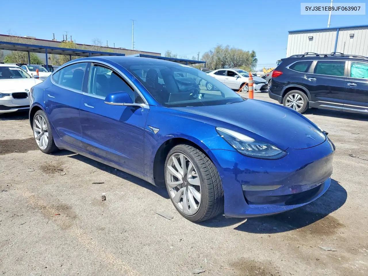 2018 Tesla Model 3 VIN: 5YJ3E1EB9JF063907 Lot: 59092156