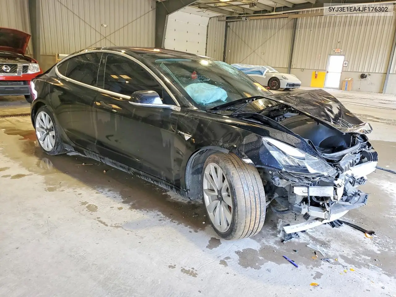 2018 Tesla Model 3 VIN: 5YJ3E1EA4JF176302 Lot: 60870716