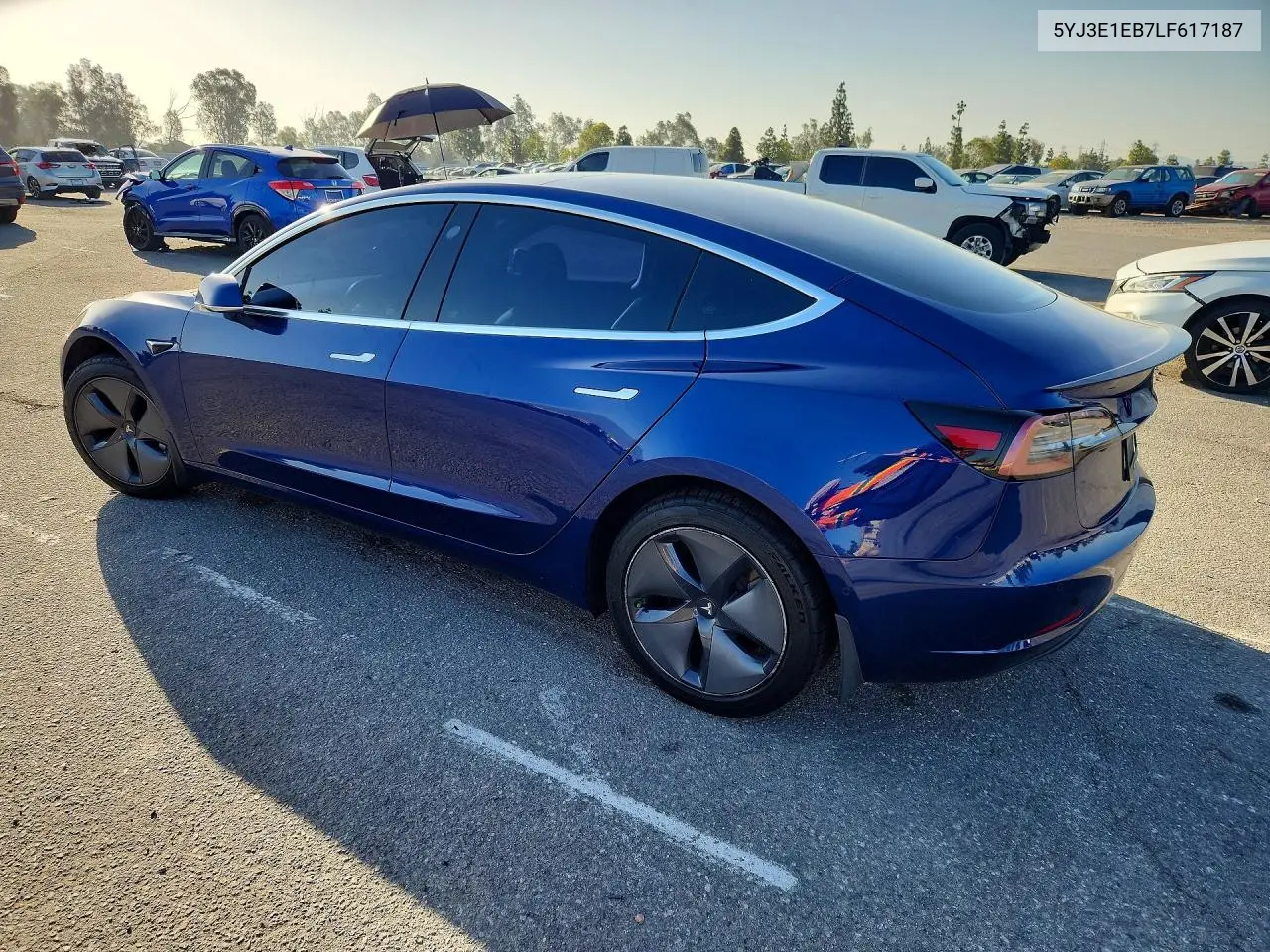 2020 Tesla Model 3 VIN: 5YJ3E1EB7LF617187 Lot: 56658326