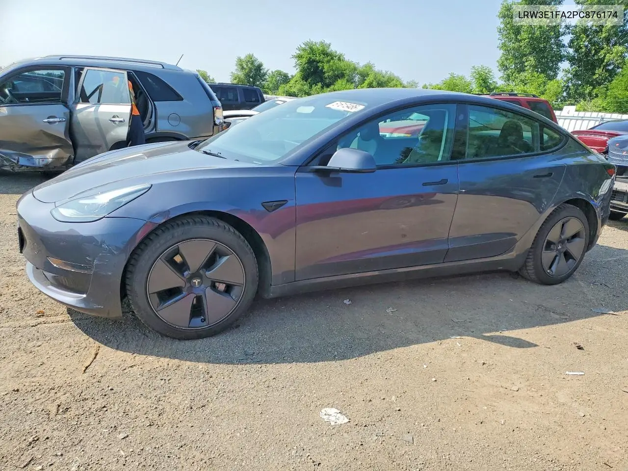 2023 Tesla Model 3 VIN: LRW3E1FA2PC876174 Lot: 61613486
