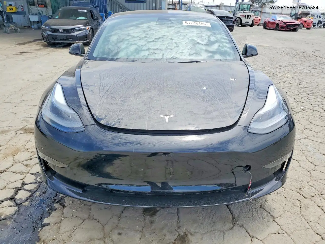 2023 Tesla Model 3 VIN: 5YJ3E1EB5PF706584 Lot: 61738156