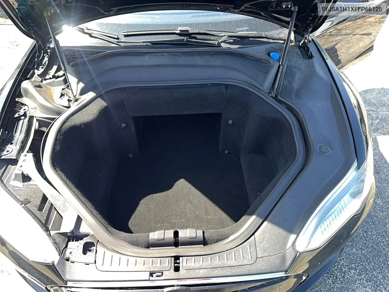 2014 Tesla Model S VIN: 5YJSA1H1XEFP66125 Lot: 59369616