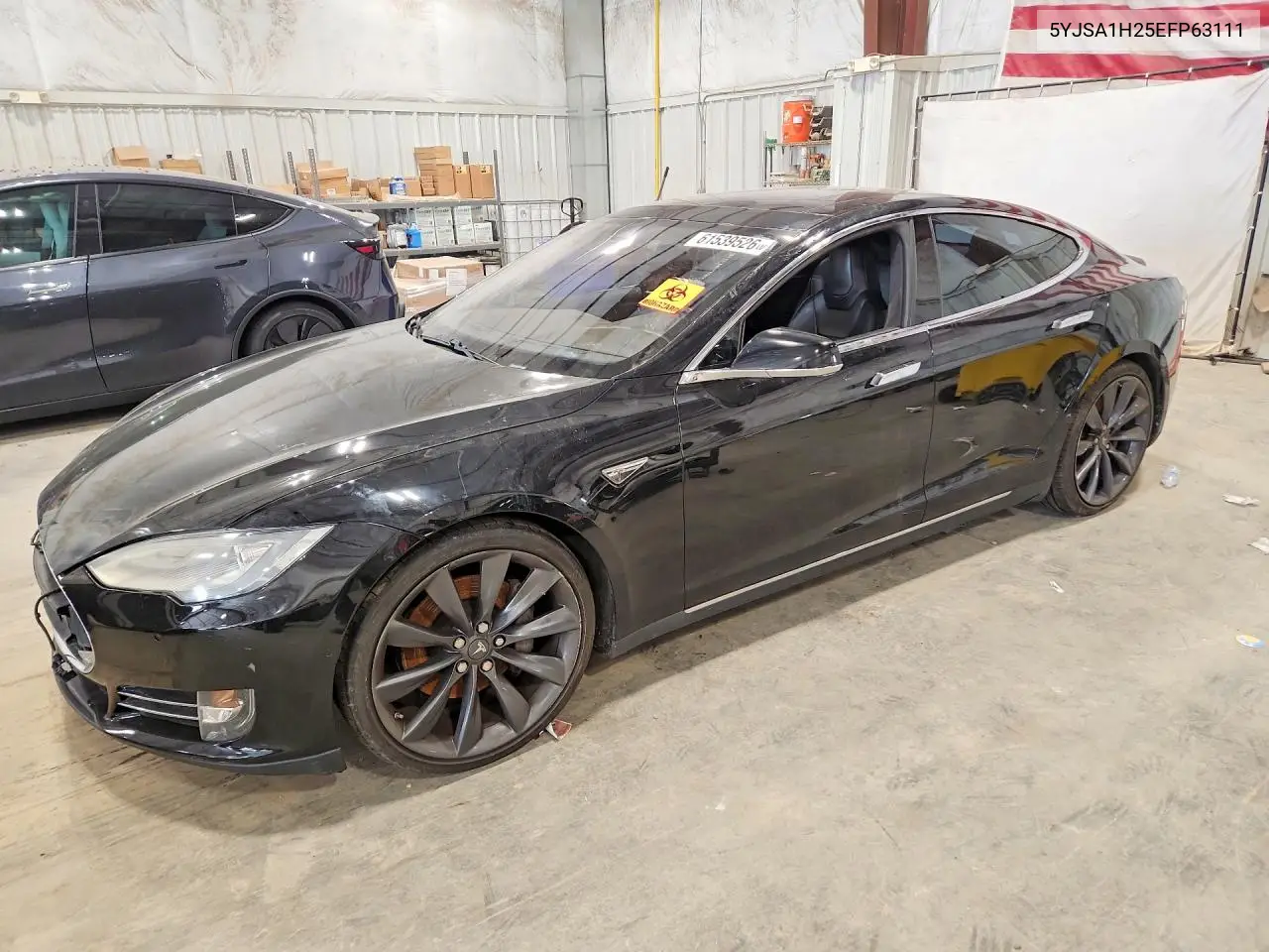 2014 Tesla Model S VIN: 5YJSA1H25EFP63111 Lot: 61539526