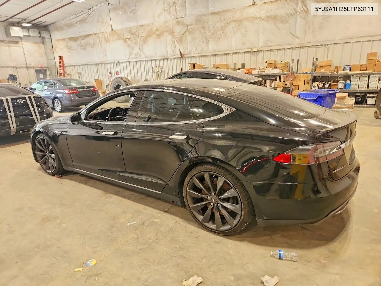 2014 Tesla Model S VIN: 5YJSA1H25EFP63111 Lot: 61539526