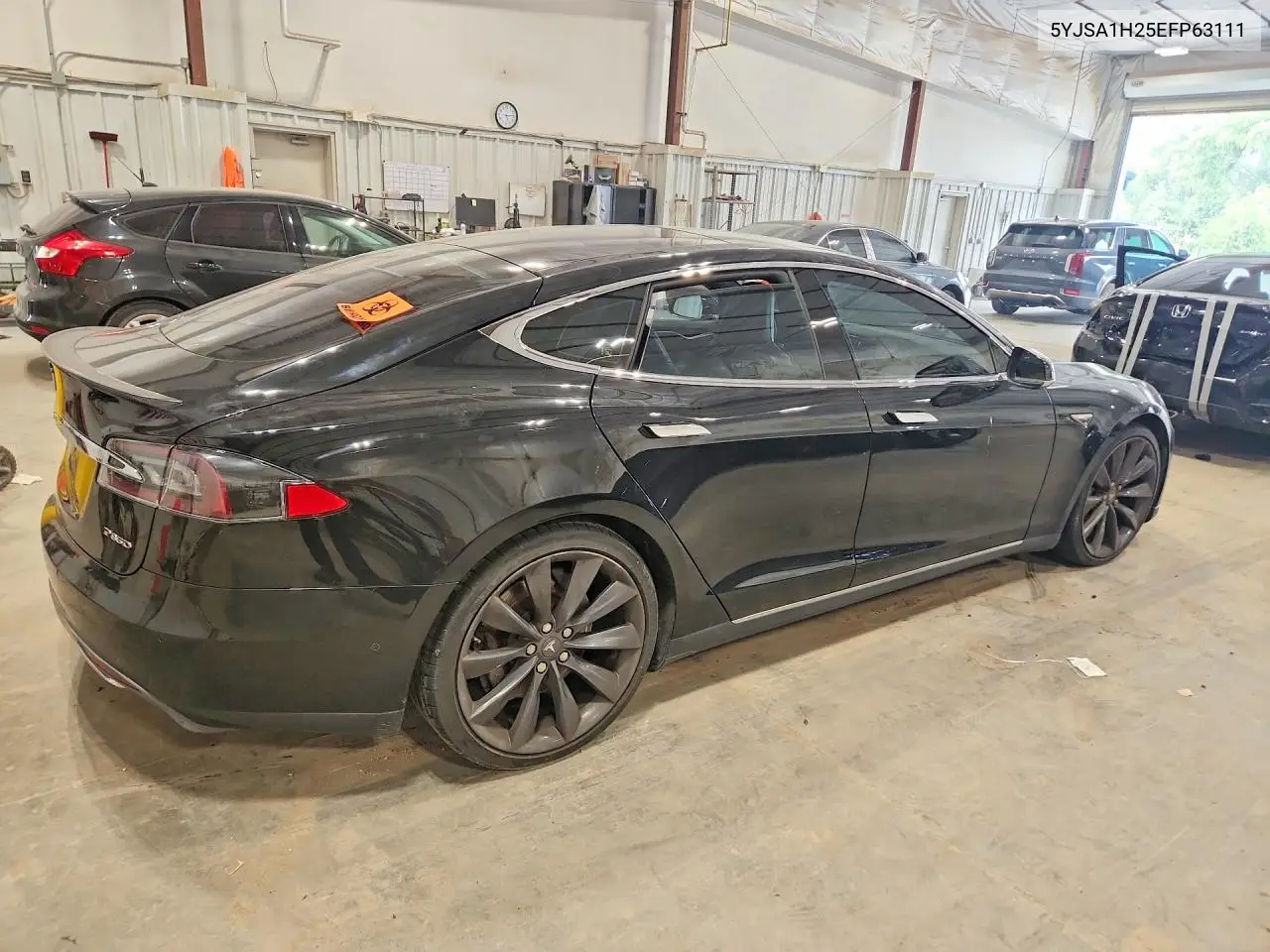 2014 Tesla Model S VIN: 5YJSA1H25EFP63111 Lot: 61539526
