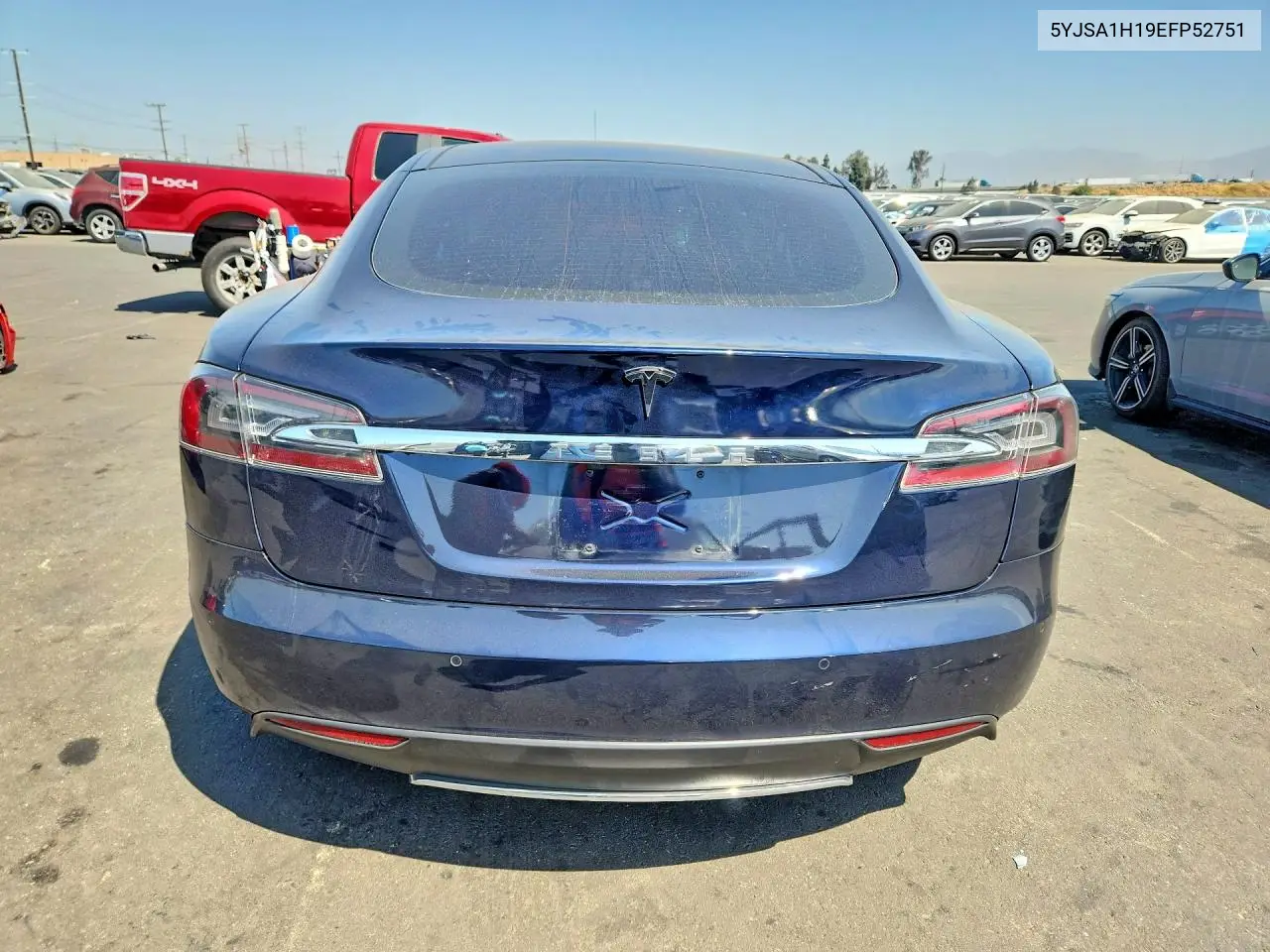 2014 Tesla Model S VIN: 5YJSA1H19EFP52751 Lot: 61599506