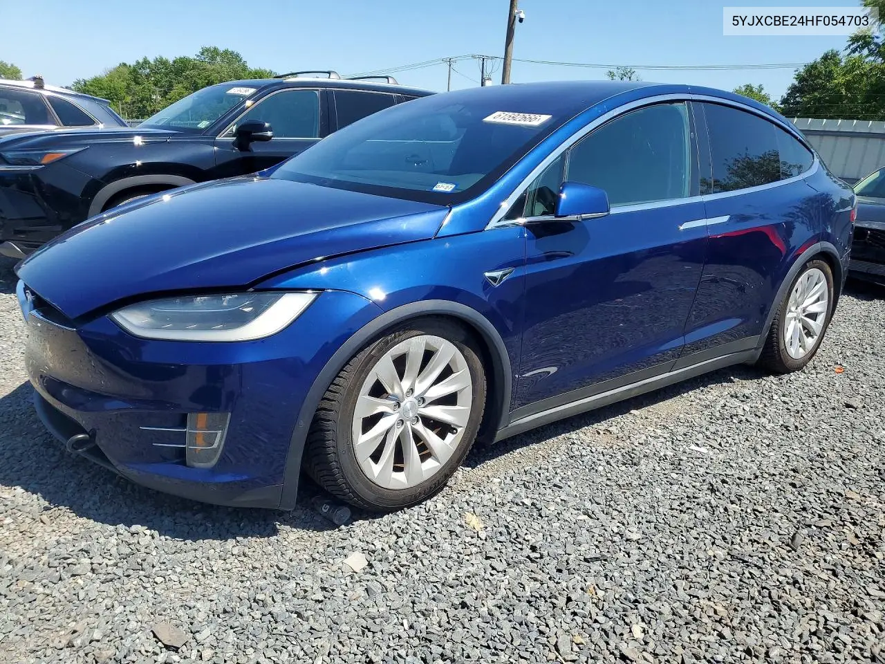 2017 Tesla Model X VIN: 5YJXCBE24HF054703 Lot: 61592666