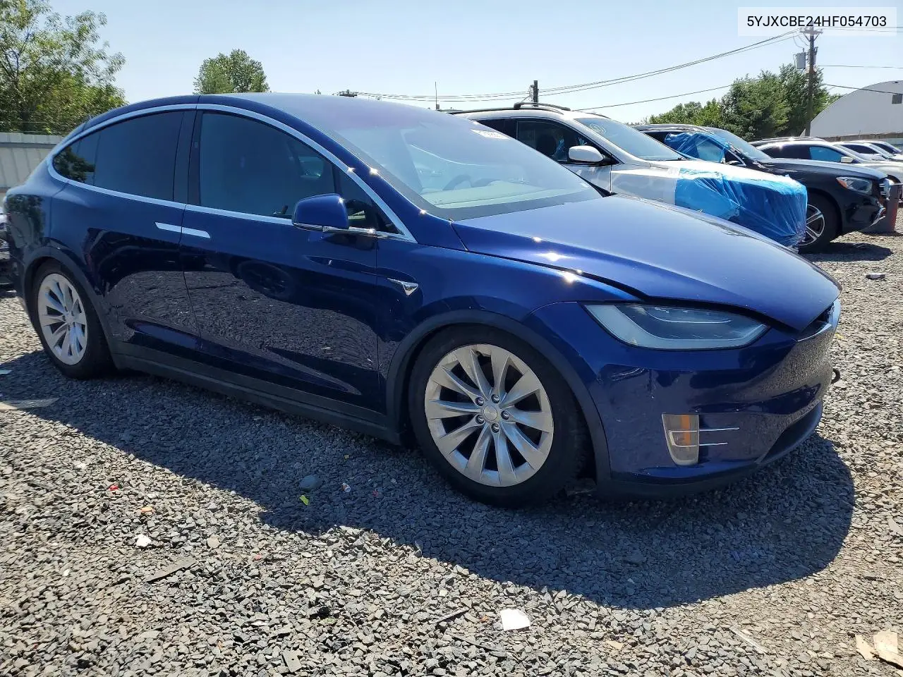 2017 Tesla Model X VIN: 5YJXCBE24HF054703 Lot: 61592666