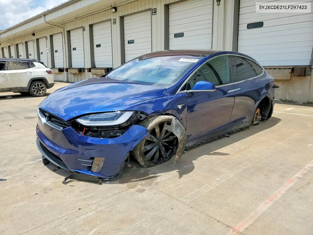 2020 Tesla Model X VIN: 5YJXCDE21LF297423 Lot: 57038646