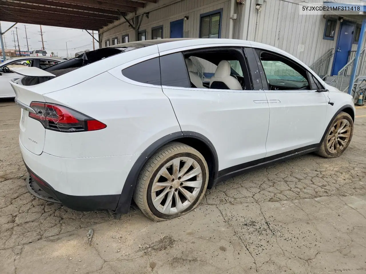 2021 Tesla Model X VIN: 5YJXCDE21MF311418 Lot: 85604505