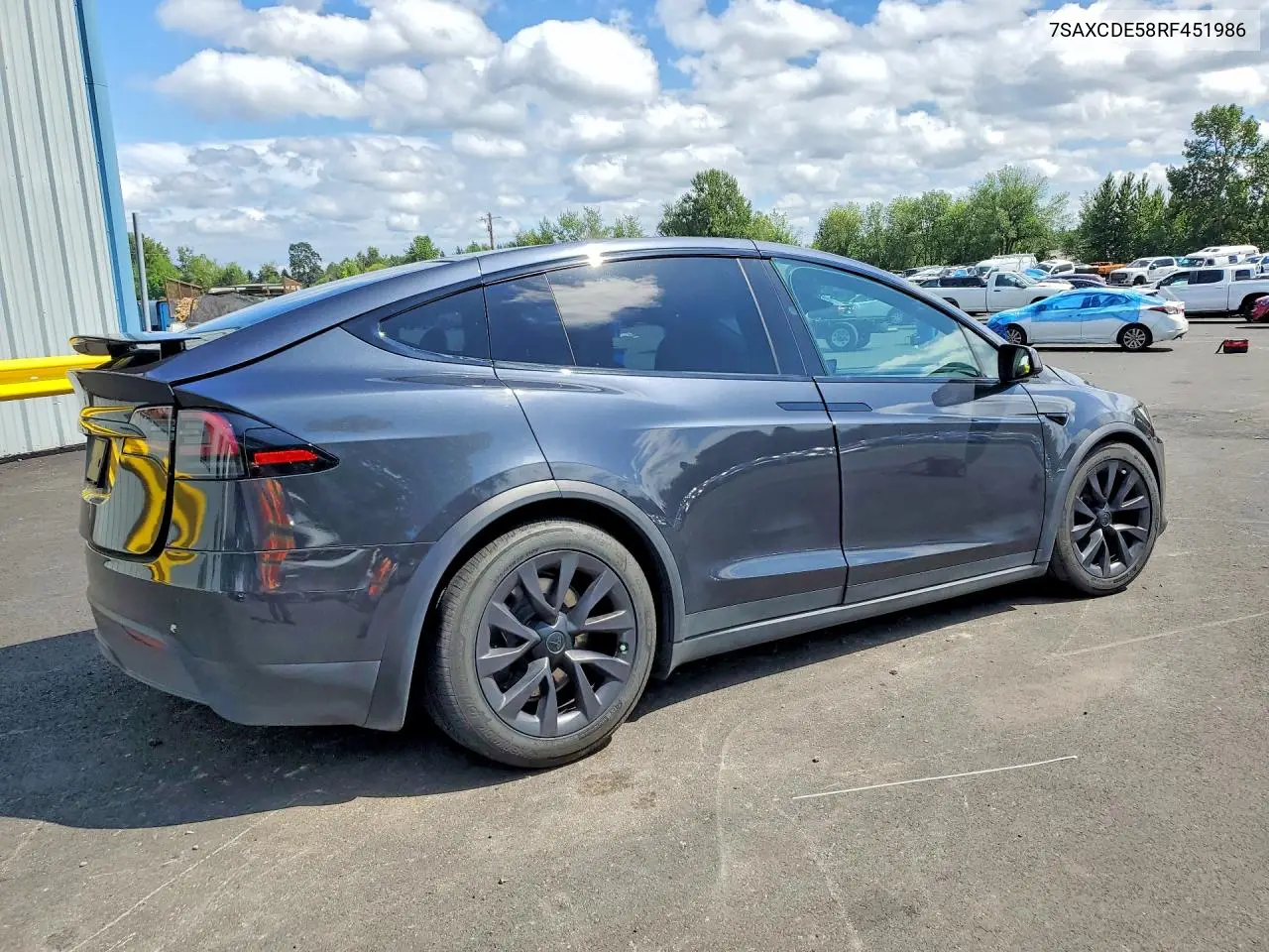 2024 Tesla Model X VIN: 7SAXCDE58RF451986 Lot: 59200306