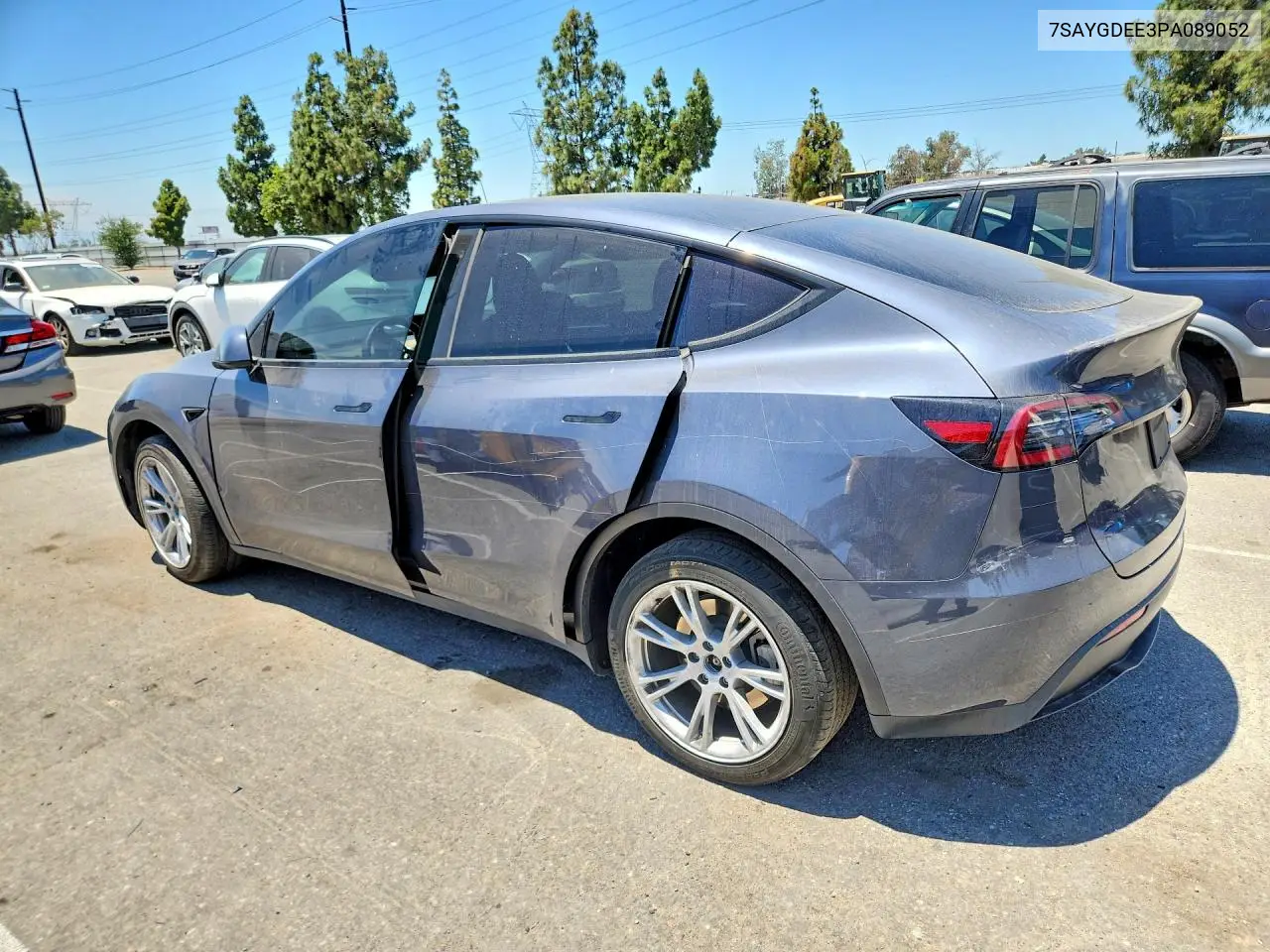 2023 Tesla Model Y VIN: 7SAYGDEE3PA089052 Lot: 57005046