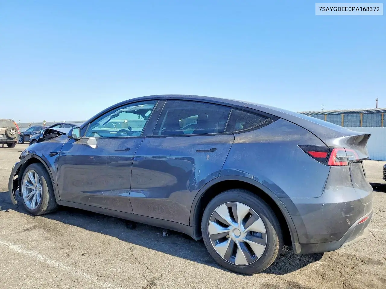 2023 Tesla Model Y VIN: 7SAYGDEE0PA168372 Lot: 60702026