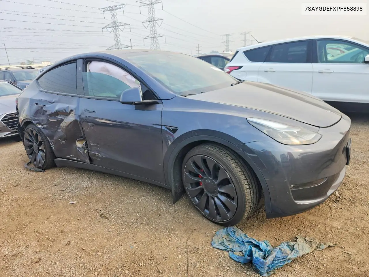 2023 Tesla Model Y VIN: 7SAYGDEFXPF858898 Lot: 61125256