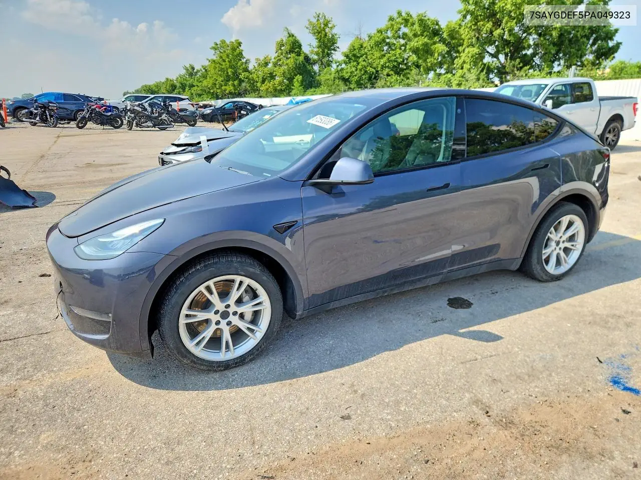 2023 Tesla Model Y VIN: 7SAYGDEF5PA049323 Lot: 61593086