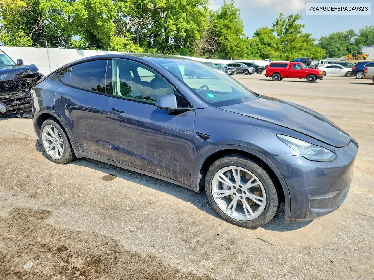 2023 Tesla Model Y VIN: 7SAYGDEF5PA049323 Lot: 61593086