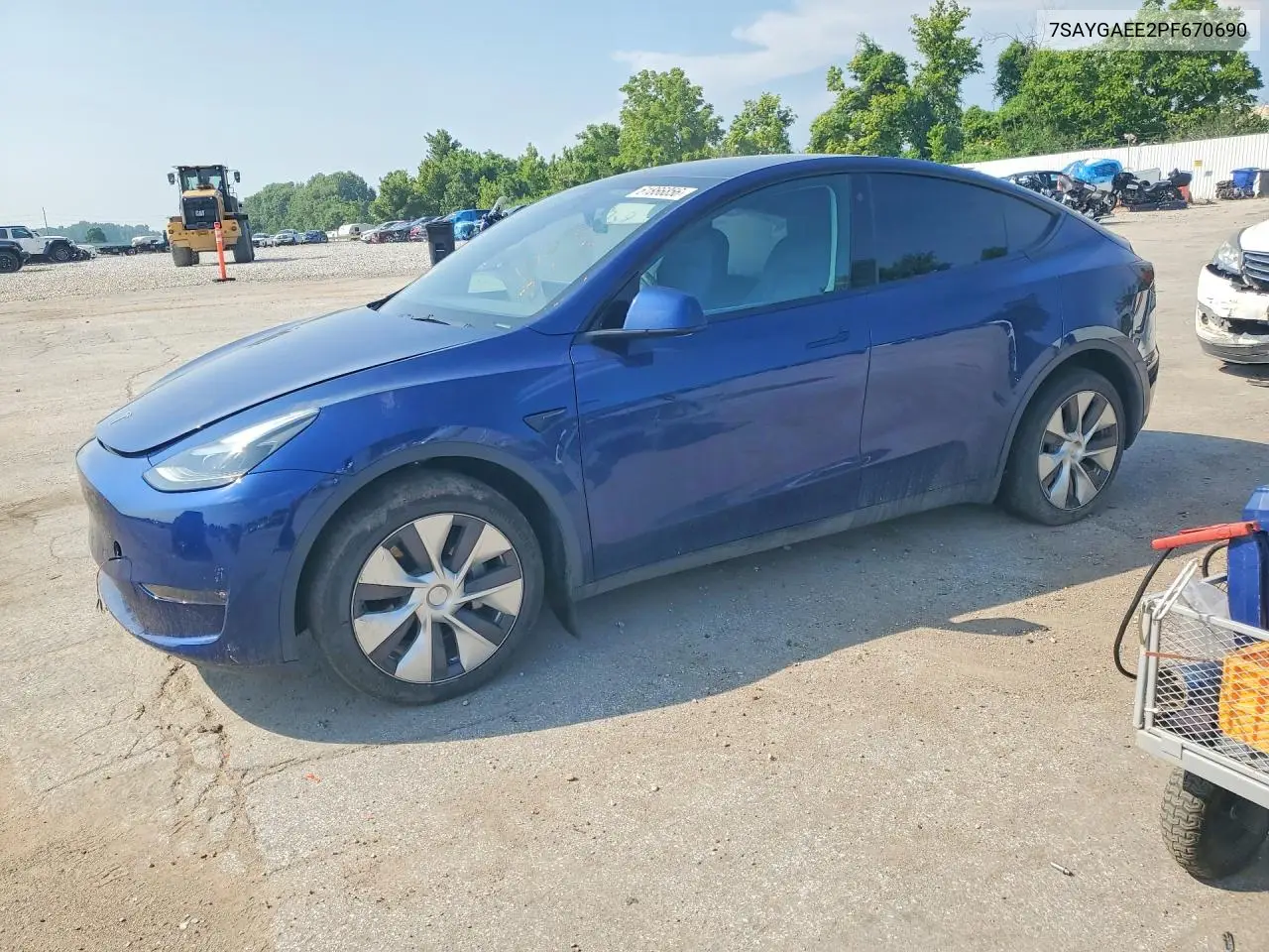 2023 Tesla Model Y VIN: 7SAYGAEE2PF670690 Lot: 61866856