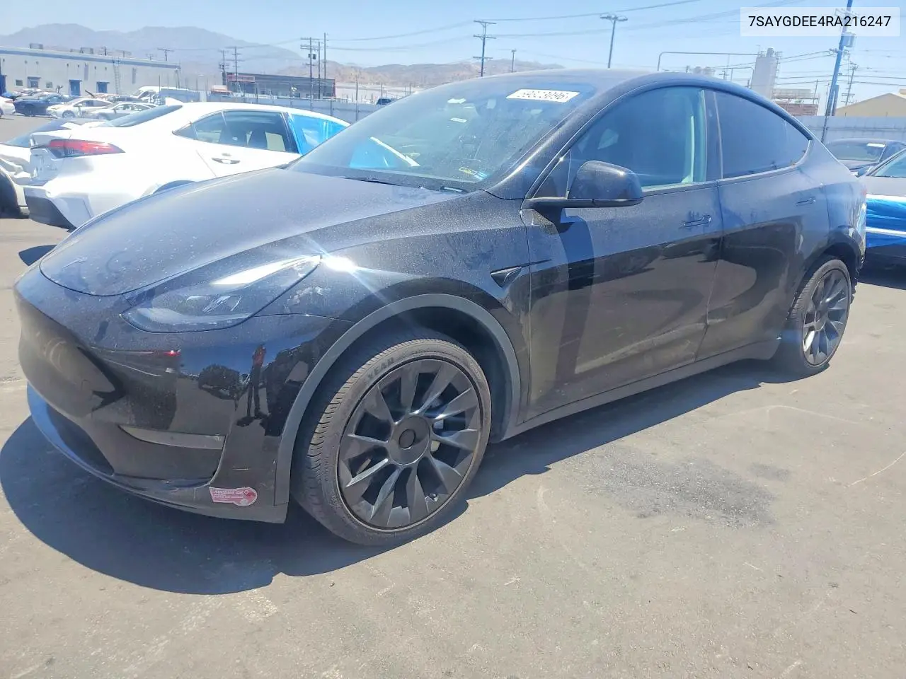 2024 Tesla Model Y VIN: 7SAYGDEE4RA216247 Lot: 59323096